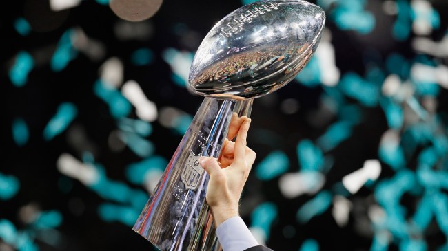Lombardi Trophy being raised after Eagles won the Super Bowl