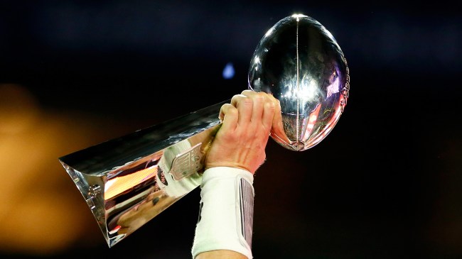Lombardi Trophy being raised at the Super Bowl