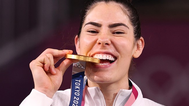 Kelsey Plum celebrates winning a gold medal at the Olympics