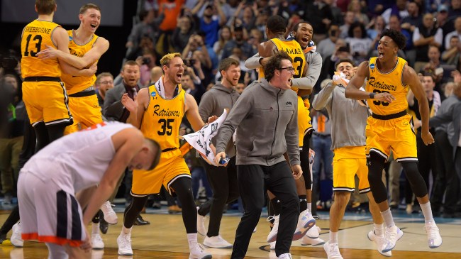UMBC celebrates after beating Virginia in the NCAA Tournament in 2018