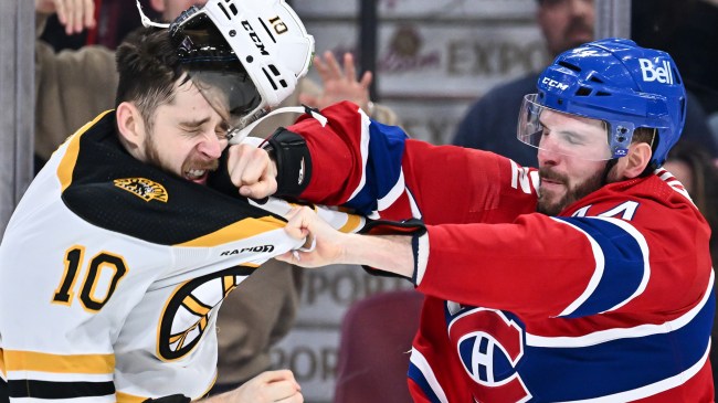 AJ Greer and Joel Armia fight during an NHL game