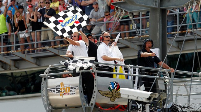 checkered flag being waved at the Indy 500